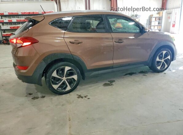 KM8J3CA23GU044120 2016 HYUNDAI TUCSON Brown 