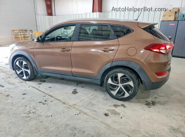 KM8J3CA23GU044120 2016 HYUNDAI TUCSON Brown 