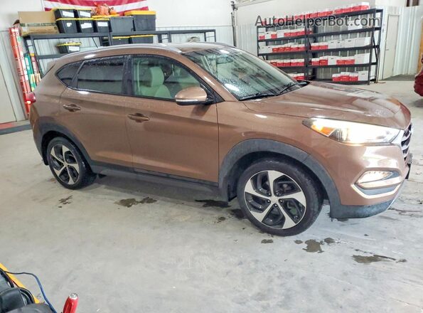 KM8J3CA23GU044120 2016 HYUNDAI TUCSON Brown 