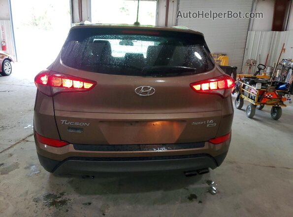 KM8J3CA23GU044120 2016 HYUNDAI TUCSON Brown 