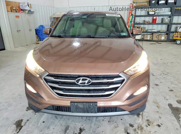KM8J3CA23GU044120 2016 HYUNDAI TUCSON Brown 