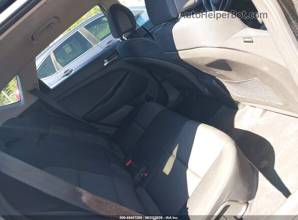 KM8J3CA23GU047437 2016 HYUNDAI TUCSON Black Widok naklejki z numerem VIN