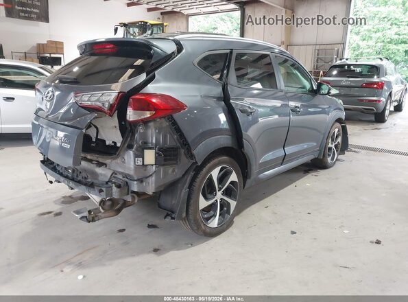 KM8J3CA23GU207932 2016 HYUNDAI TUCSON Gray Rear right