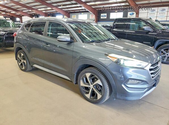 KM8J3CA24HU457472 2017 HYUNDAI TUCSON Gray 