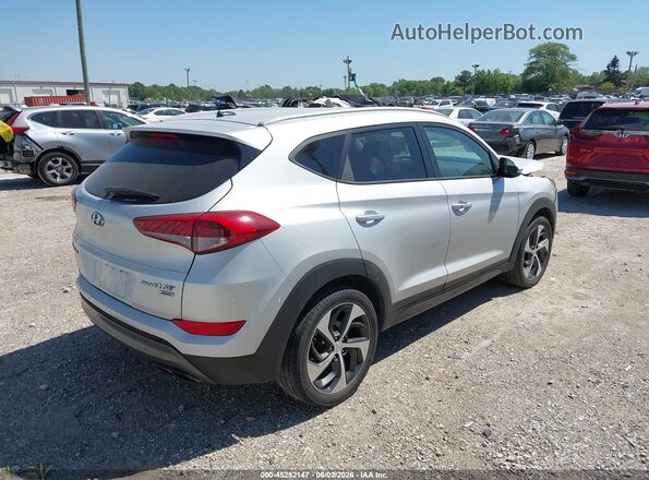 KM8J3CA25GU033040 2016 HYUNDAI TUCSON Серебряный Задняя правая четверть