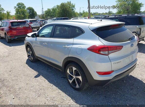 KM8J3CA25GU033040 2016 HYUNDAI TUCSON Серебряный Задняя левая четверть