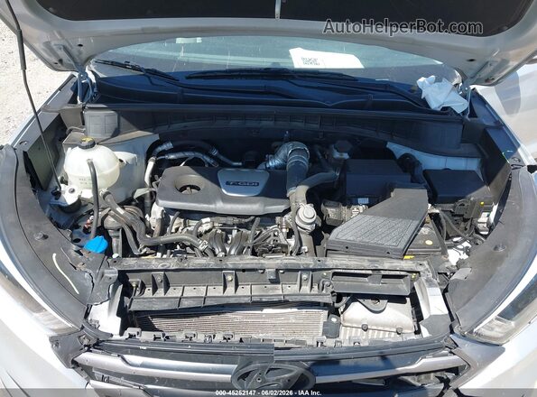 KM8J3CA25GU033040 2016 HYUNDAI TUCSON Серебряный Вид сзади