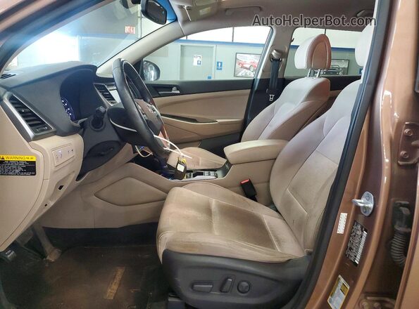 KM8J3CA25GU111008 2016 HYUNDAI TUCSON Коричневый 