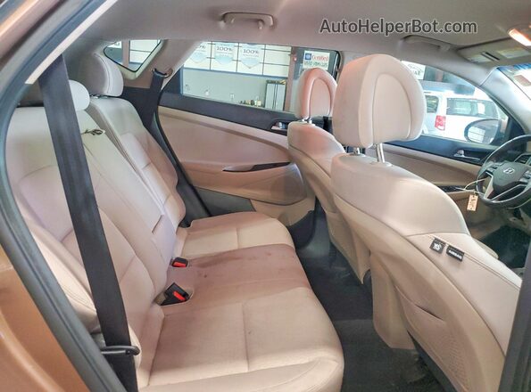 KM8J3CA25GU111008 2016 HYUNDAI TUCSON Коричневый 