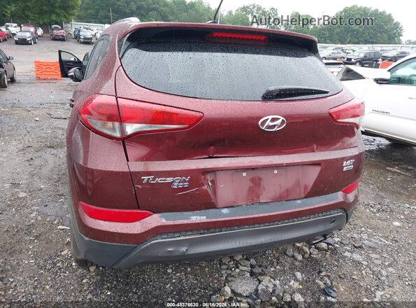 KM8J3CA26GU023973 2016 HYUNDAI TUCSON Burgundy Front view