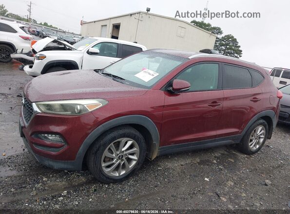 KM8J3CA26GU023973 2016 HYUNDAI TUCSON Burgundy 360 interior view