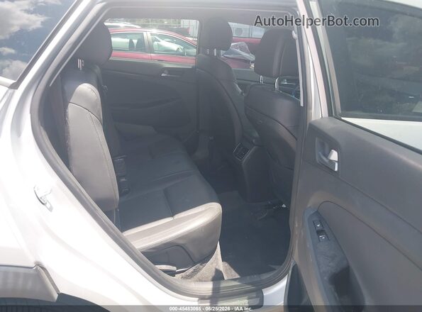 KM8J3CA26GU126410 2016 HYUNDAI TUCSON Silver Вид наклейки з VIN-кодом