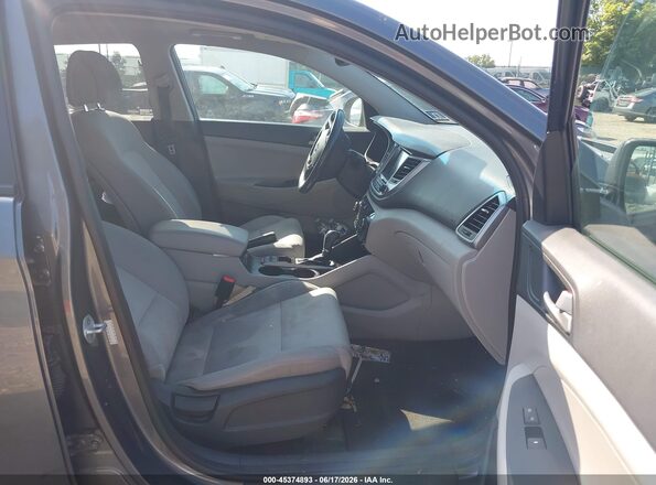 KM8J3CA26JU755723 2018 HYUNDAI TUCSON Black Вид салону спереду