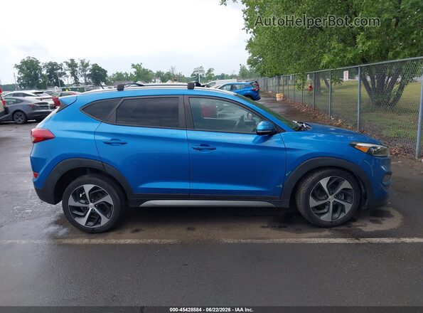 KM8J3CA27HU265074 2017 HYUNDAI TUCSON Blue 360 interior view