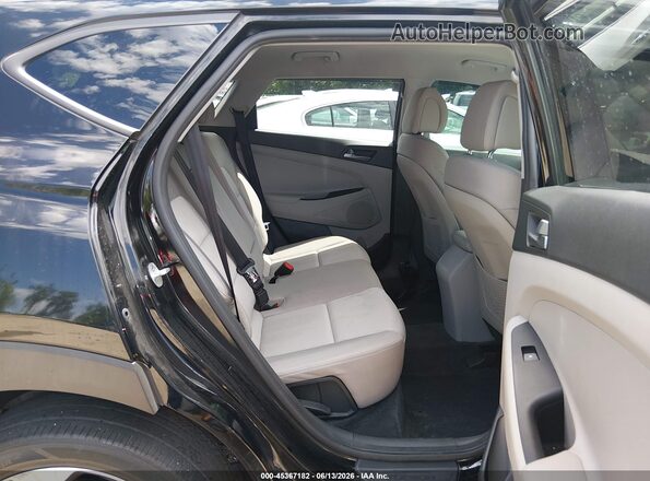 KM8J3CA29GU161863 2016 HYUNDAI TUCSON Black Vista de la etiqueta del VIN