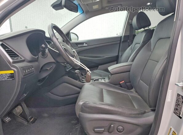 KM8J3CA2XGU088437 2016 HYUNDAI TUCSON Silver Vista interior delantera