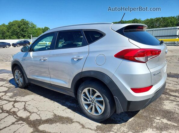 KM8J3CA42GU222973 2016 HYUNDAI TUCSON Silver Trasero izquierdo