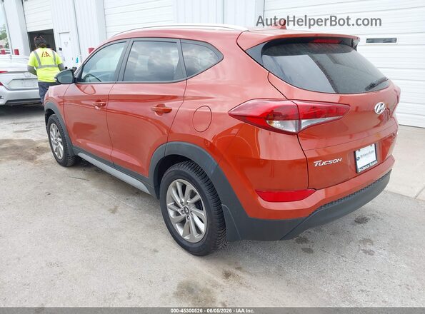 KM8J3CA46HU450069 2017 HYUNDAI TUCSON Оранжевый Задняя левая четверть