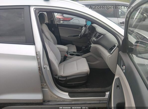 KM8J3CA46JU670849 2018 HYUNDAI TUCSON Silver წინა სალონის ხედი