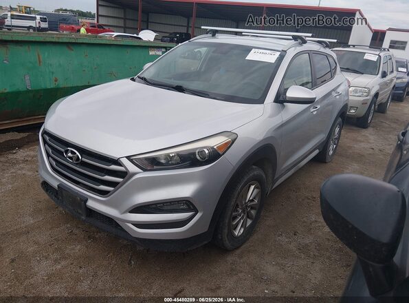 KM8J3CA46JU670849 2018 HYUNDAI TUCSON Silver წინა მარცხენა ხედი სამი მეოთხედიდან