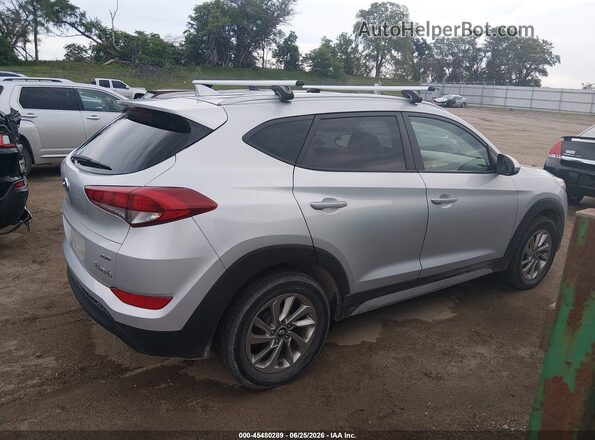 KM8J3CA46JU670849 2018 HYUNDAI TUCSON Silver უკანა სალონის ხედი