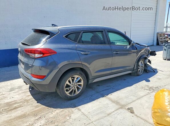 KM8J3CA47JU747535 2018 HYUNDAI TUCSON Gray 