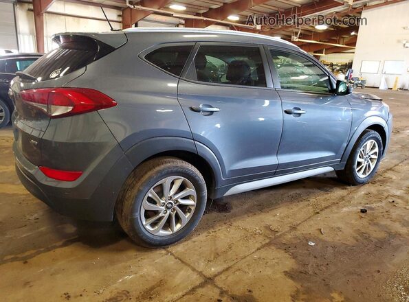 KM8J3CA49HU489092 2017 HYUNDAI TUCSON Gray 