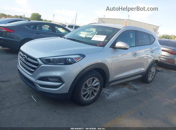 KM8J3CA49JU775126 2018 HYUNDAI TUCSON Silver წინა მარცხენა ხედი სამი მეოთხედიდან