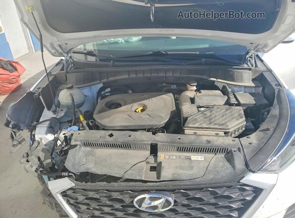 KM8J3CA4XKU034033 2019 HYUNDAI TUCSON White Rear interior view