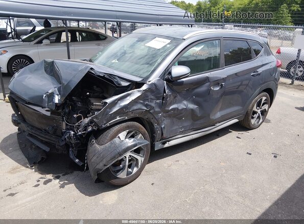 KM8J3CAL0JU778990 2018 HYUNDAI TUCSON Gray Front left