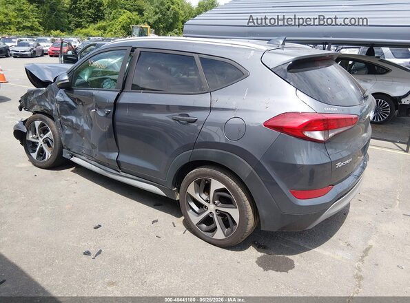KM8J3CAL0JU778990 2018 HYUNDAI TUCSON Gray Rear left