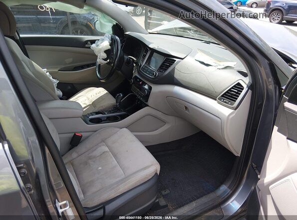 KM8J3CAL0JU778990 2018 HYUNDAI TUCSON Gray Front interior view