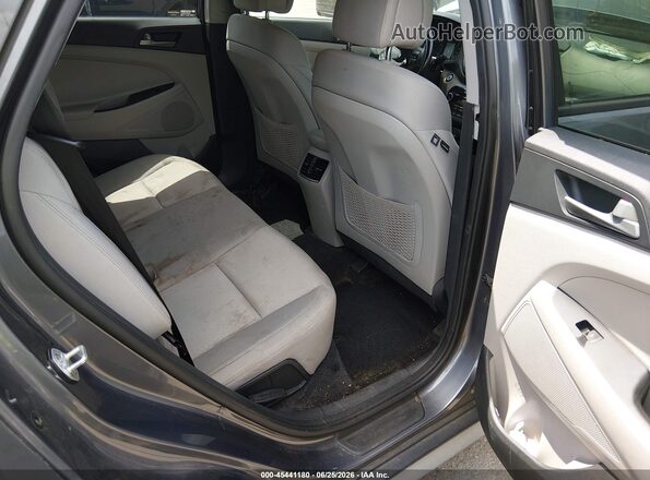 KM8J3CAL0JU778990 2018 HYUNDAI TUCSON Gray VIN sticker view