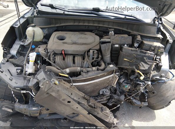 KM8J3CAL0JU778990 2018 HYUNDAI TUCSON Gray Rear view