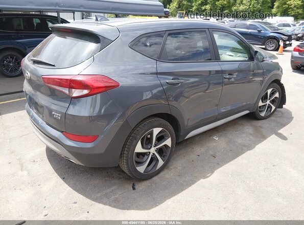KM8J3CAL0JU778990 2018 HYUNDAI TUCSON Gray Rear right