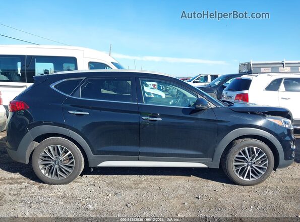 KM8J3CAL0KU959749 2019 HYUNDAI TUCSON Черный Вид задней части салона