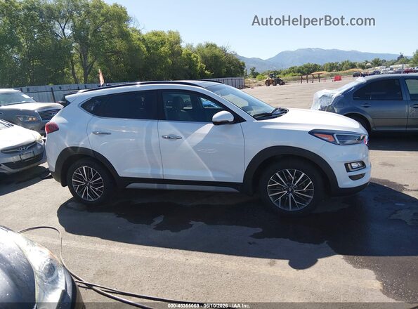 KM8J3CAL0MU287615 2021 HYUNDAI TUCSON White Rear interior view