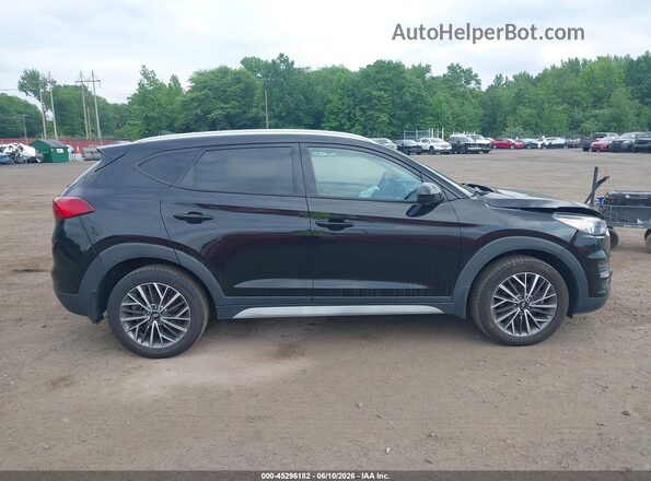 KM8J3CAL2MU324373 2021 HYUNDAI TUCSON Black Rear interior view