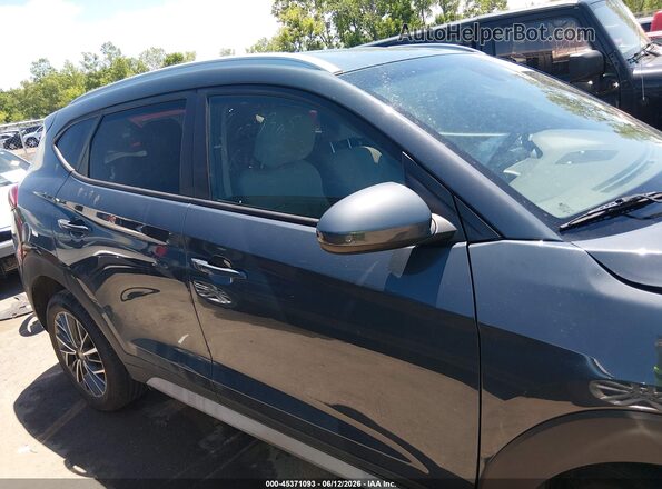 KM8J3CAL2MU408063 2021 HYUNDAI TUCSON Blue Vista interior trasera