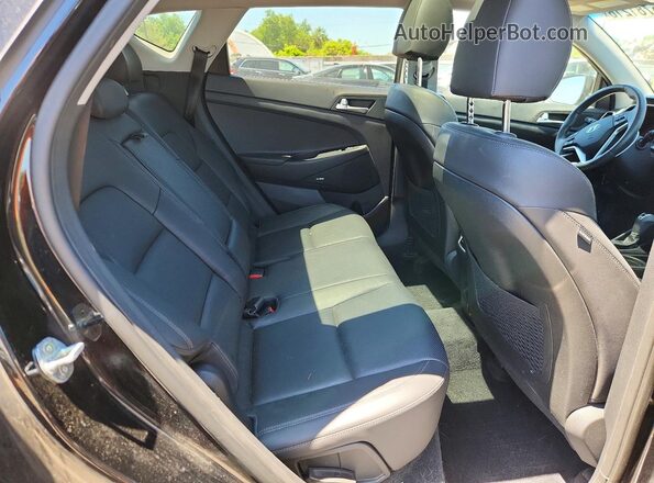 KM8J3CAL4MU361165 2021 HYUNDAI TUCSON Black Vista interior trasera