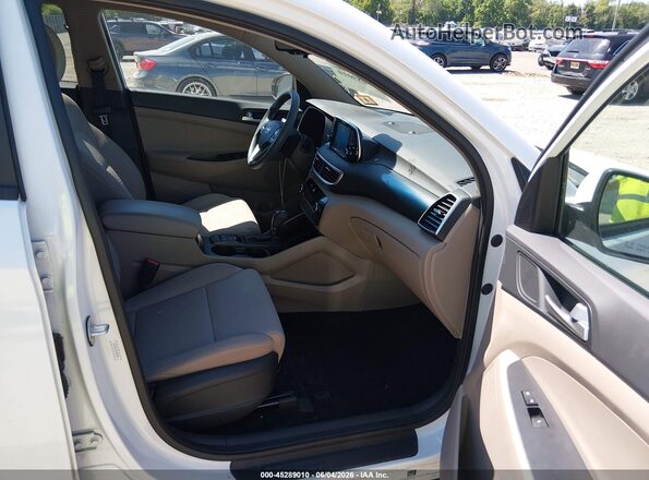 KM8J3CAL5KU891044 2019 HYUNDAI TUCSON White წინა სალონის ხედი