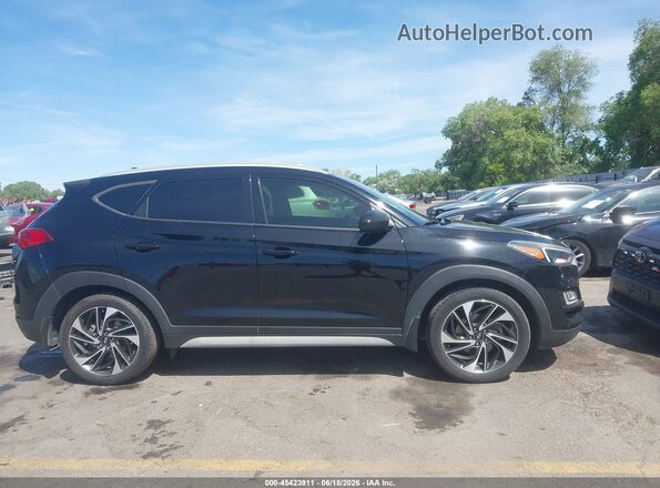KM8J3CAL5KU953428 2019 HYUNDAI TUCSON Black უკანა სალონის ხედი