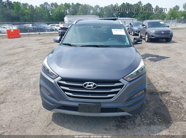 KM8J3CAL6JU741135 2018 HYUNDAI TUCSON Gray Սալոնի հետևի տեսք