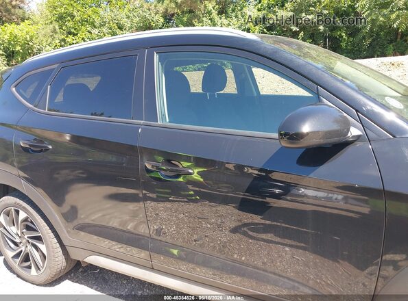 KM8J3CAL6MU318883 2021 HYUNDAI TUCSON Black Widok wnętrza z tyłu