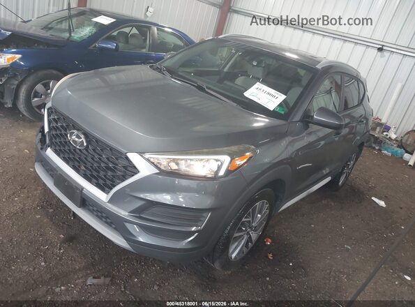 KM8J3CAL7KU960414 2019 HYUNDAI TUCSON Gray Vista tres cuartos delantera izquierda