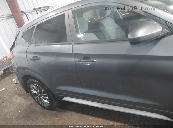 KM8J3CAL7KU960414 2019 HYUNDAI TUCSON Gray Vista interior trasera