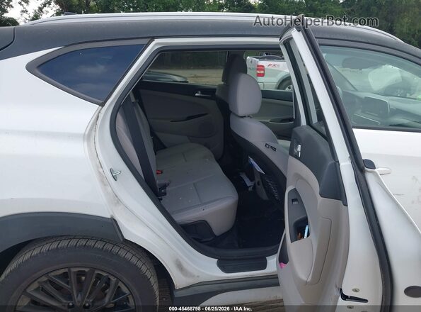 KM8J3CAL7LU086941 2020 HYUNDAI TUCSON White VIN კოდის სტიკერის ხედი
