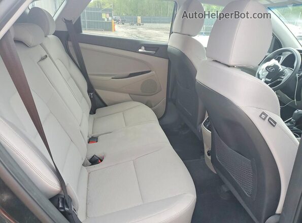 KM8J3CAL9KU889054 2019 HYUNDAI TUCSON Black Vista interior trasera