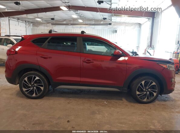 KM8J3CALXMU394140 2021 HYUNDAI TUCSON Red Widok wnętrza z tyłu