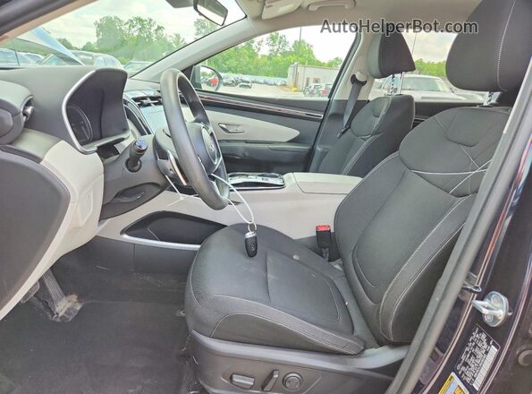 KM8JBCA13NU082485 2022 HYUNDAI TUCSON Blue Front interior view